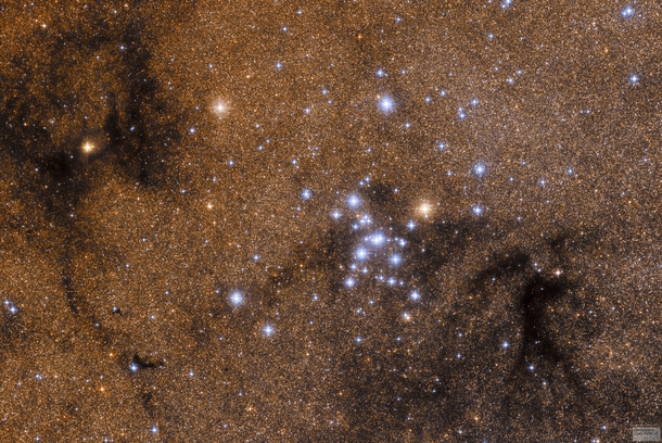 M is one of the most prominent open clusters of stars on the sky The cluster dominated by bright blue stars contains about  stars in total is about  million years old spans  light-years across and lies about  light-years away 