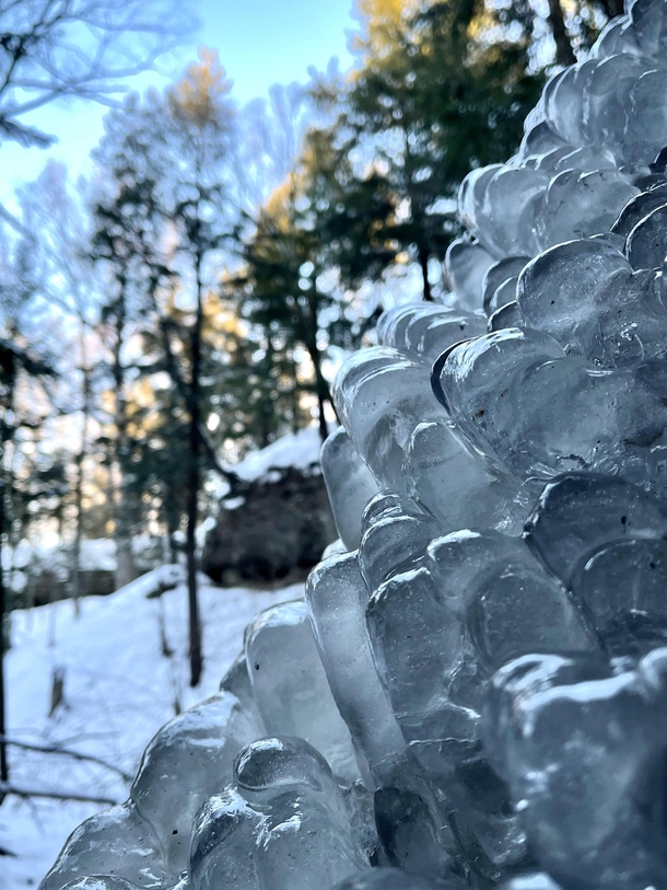 Macro of ice folds from frozen waterfall Michigans Upper Peninsula 