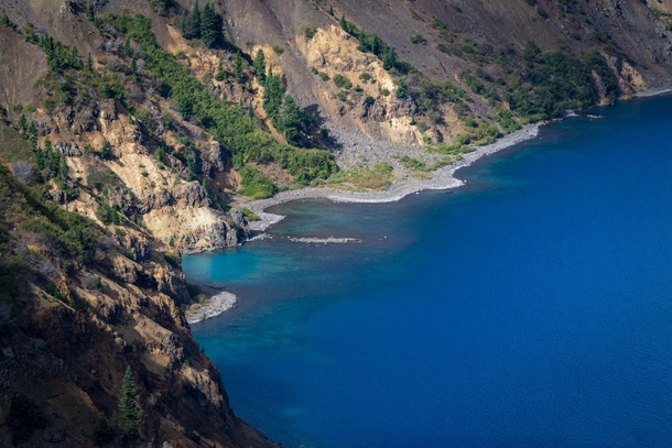 Magically blue clear waters of Crater Lake Oregon 