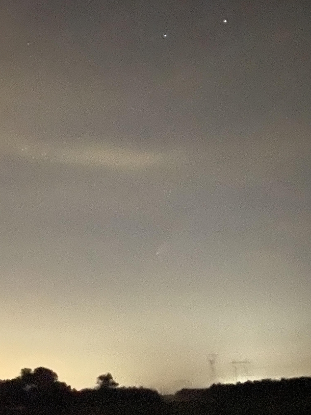 Managed to snap a pretty grainy picture of the comet with my phone Not a great image but I was happy to at least capture it