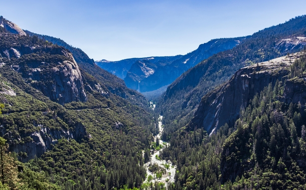 Meandering Merced river seen from an overlook while going down into the Yosemite Valley 