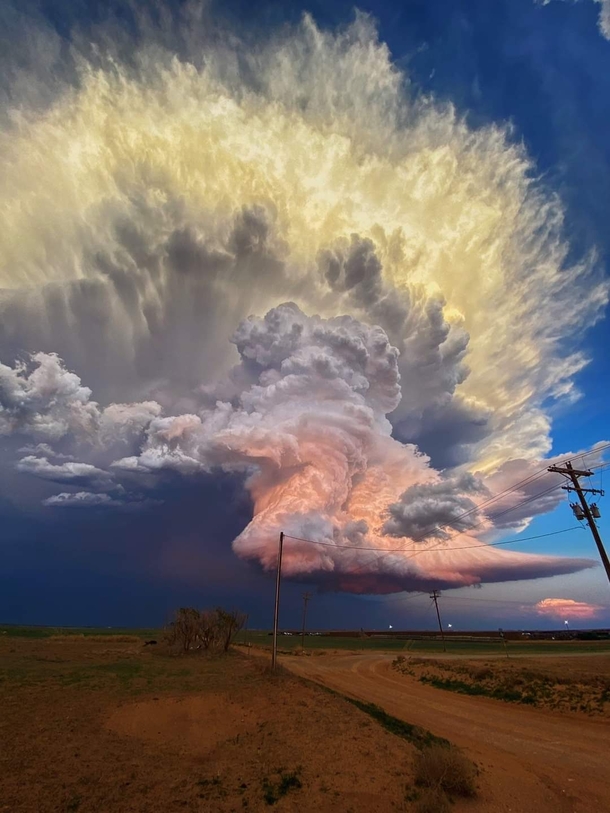 Meanwhilein west Texas storm chaser Laura Rowe captured the picture of a lifetime last night May   with this fantastic shot of a mature supercell thunderstorm illuminated at varying heights from the setting sun