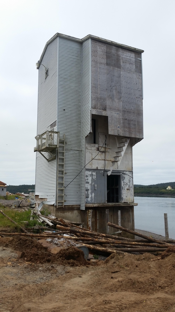 Missing staircase leading up to the remains of a fish plant in Nova Scotia