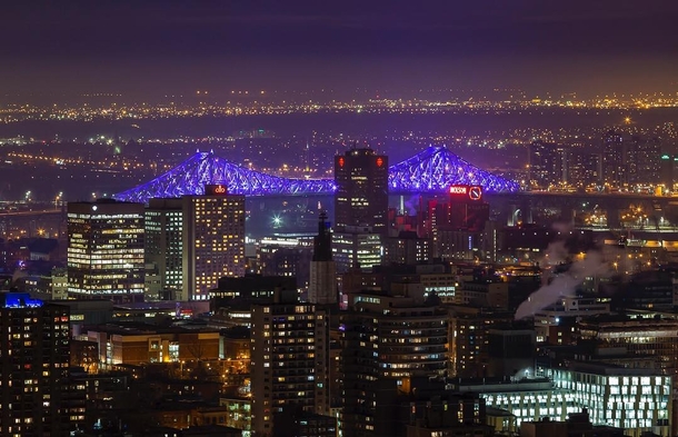 Montreal with its illuminated Jacques-Cartier Bridge evablue