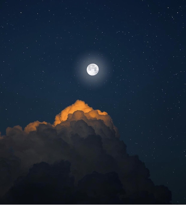 Moon illuminates clouds photo by Astrovas