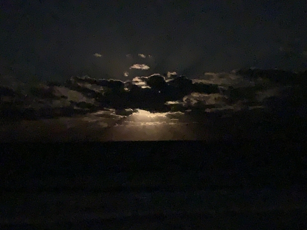 Moonrise behind the clouds over the Atlantic tonight