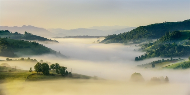 Morning over Holbav Village Hills Romania Photo by Ioan Chiriac 