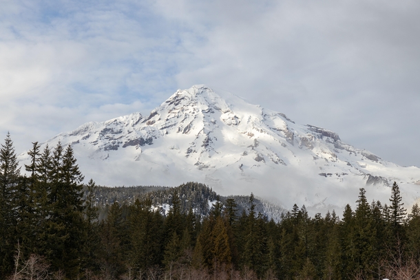 Mount Rainier emerging from behind the clouds today 