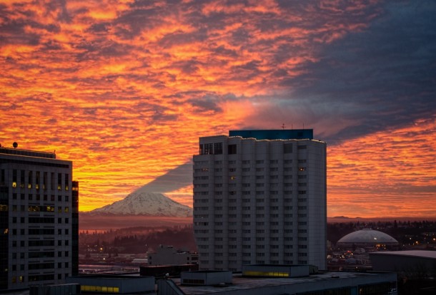 Mt Rainer Casting a Shadow above a building  x-post from rpics
