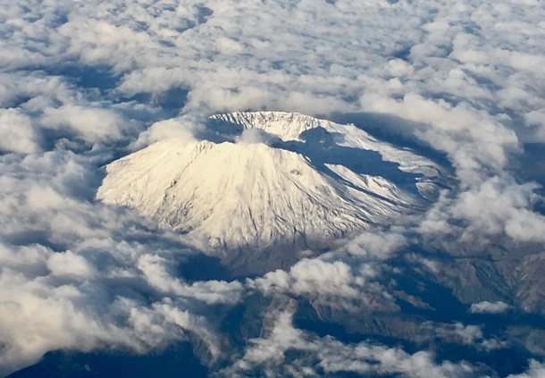 Mt St Helens from my airplane seat I posted this pic once before but its the the th anniversary of the eruption  x  