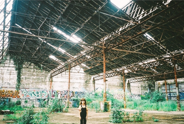 My daughter in an abandoned train shed mm film Erskineville NSW Australia 
