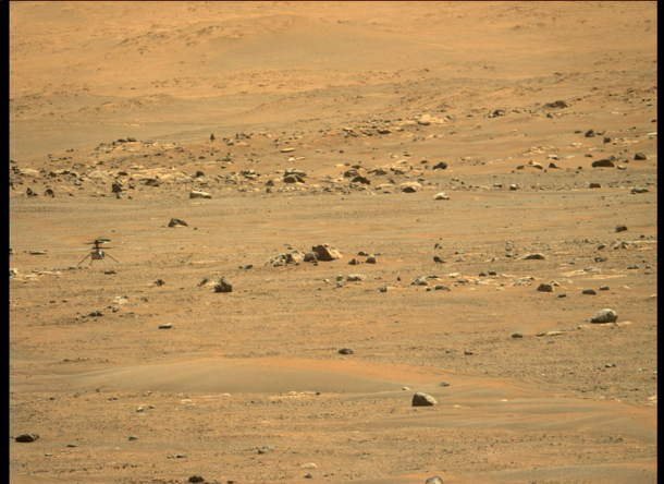 NASAs Ingenuity Mars Helicopters was captured after landing on May   by the Mastcam-Z imager one of the instruments aboard the agencys Perseverance rover The helicopter ascended to a new height record of  feet  meters and flew  feet  meters to a new landi