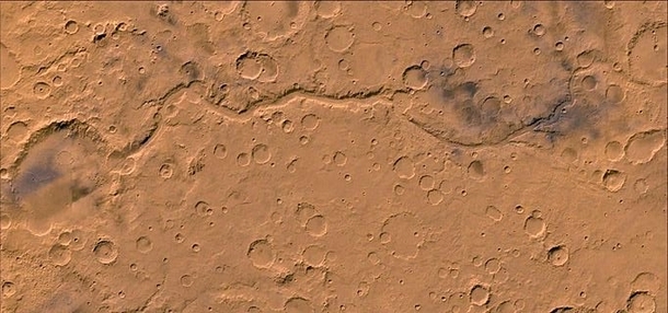 Not only Valles Marinaris but also Maadim Vallis is significantly longer wider and deeper than Earths Grand Canyon at over  km long  km wide and  km deep  Viking