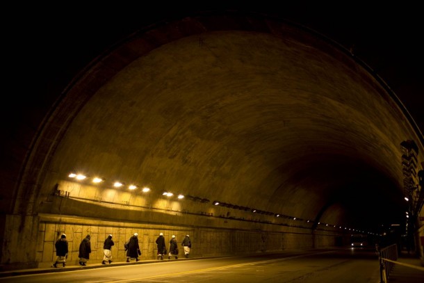 Nuns walk through a tunnel leading towards St Peters Square to attend the inauguration of Pope Francis at the Vatican 