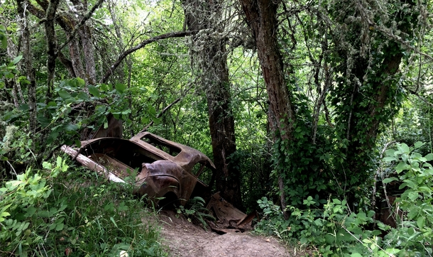 Old car left beside a bike trail miles from any road it could fit on - Salem OR - 