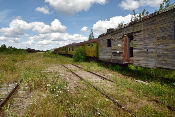 Old carriages rust on the overgrown tracks of the Lesnaya station of the Gaino-Kayskaya prison railway in Russia