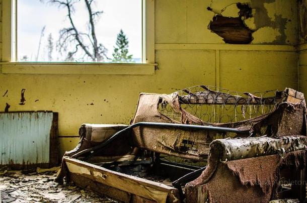 Old couch in an abandoned Montana mining town 