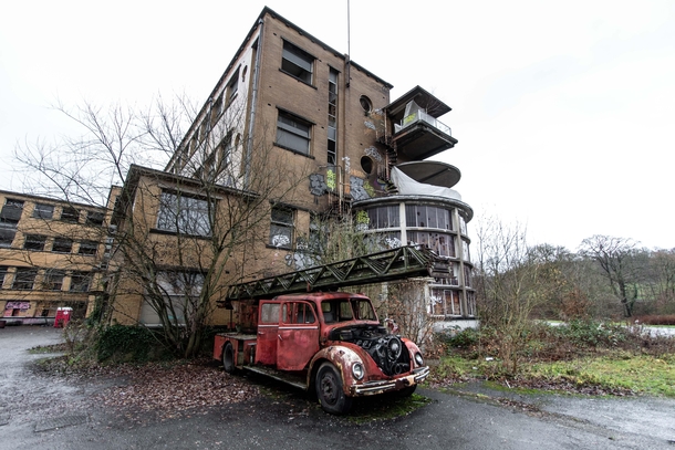 Old fire truck in front of an abandoned sanatorium Belgium 