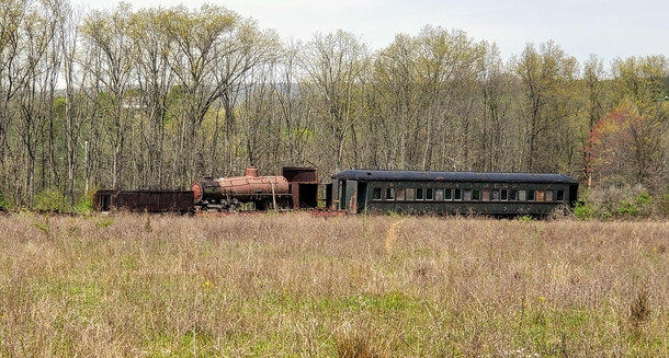 Old locomotive and passenger car 