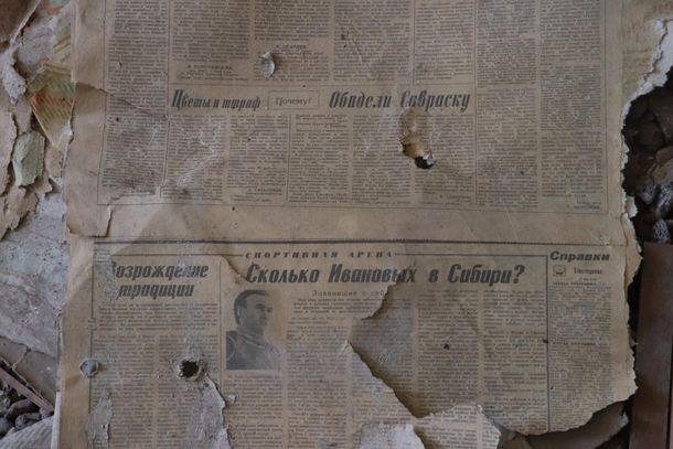 Old newspaper in small abonded city Irbene