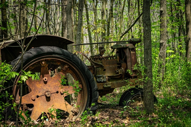 Old tractor in the woods Southeast Wisconsin