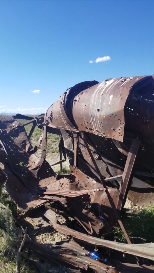 Once was a bus Wind and sun have turned it to rust Near Elko NV