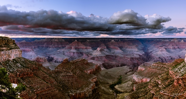 One-point-seven billion years of earths geology exposed Grand Canyon from the south rim just after the sun drops below the horizon at sunset Oct  