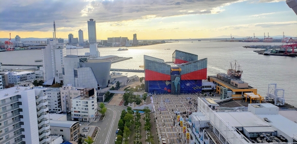 Osaka as seen from the Tempozan Ferris Wheel The blue and red building is the Kaiyukan Aquarium 