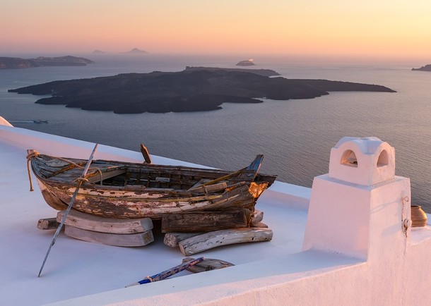 Overlooking the Aegean Sea from a rooftop in Santorini Greece  Photo by Igor Ivanov