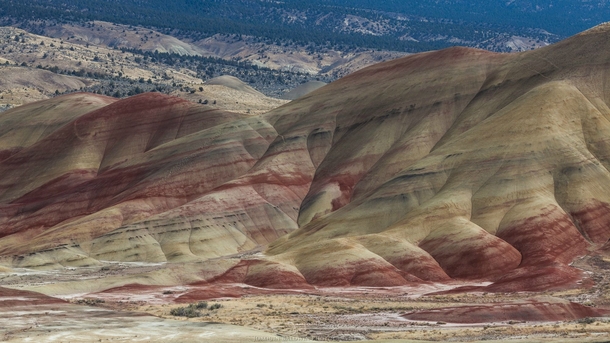 Painted Hills Oregon contrasting with some distant blues 