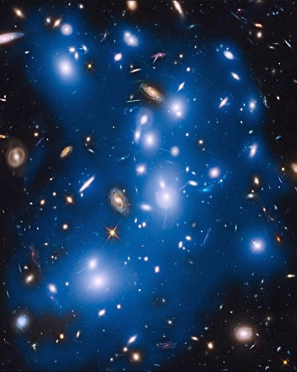 Pandoras Cluster is a massive galaxy cluster located about  billion light years away from us