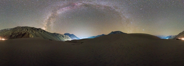 Panorama - Milkway over Hundar VillageWhite Sand Dunes Hundar is a village in the Leh district of Ladakh India famous for Sand dune Bactrian camel   x  
