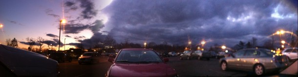 Panoramic picture of dark stormy clouds to beautiful colorful sky  