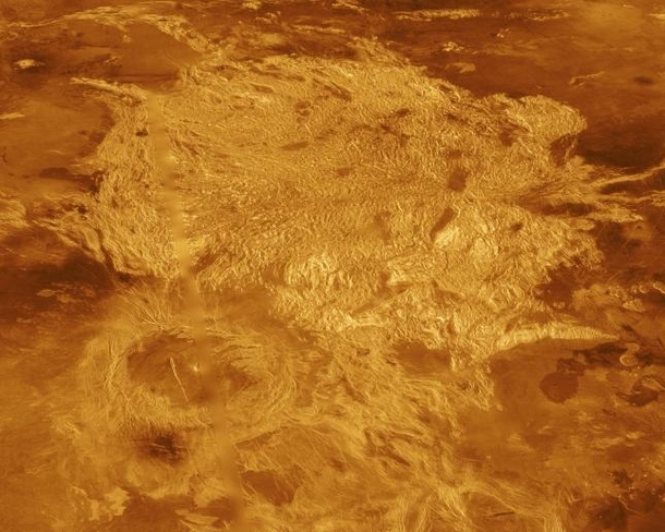 Part of Alpha Regio is shown in this three-dimensional perspective view of the surface of Venus Alpha Regio a topographic plateau approximately  kilometers in diameter The simulated hues are based on color images recorded by Soviet Venera  and  ships