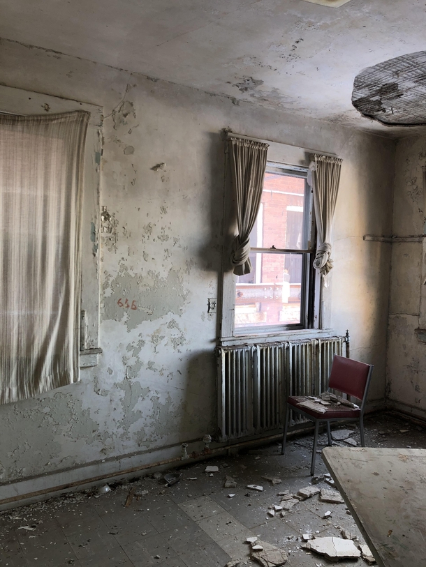 Patient room in abandoned mental health hospital