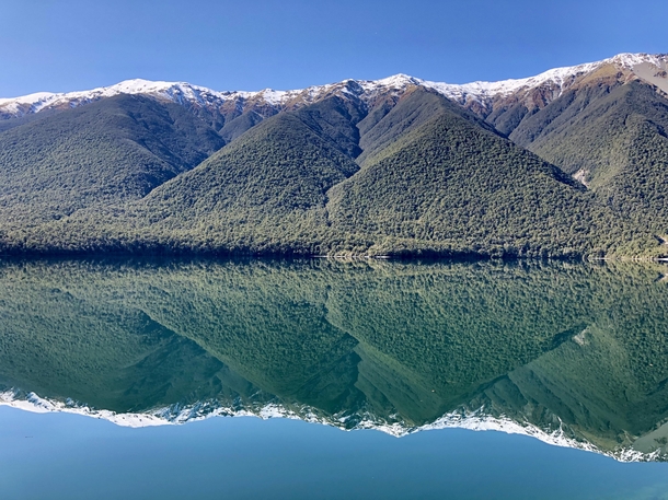 Perfect reflection at Lake Rotoiti Nelson Lakes National Park NZ 