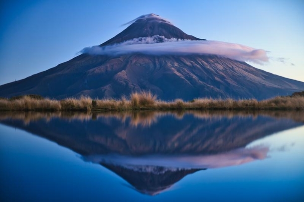 Perfect reflection at Mt Taranaki New Zealand  By marcograssiphotography