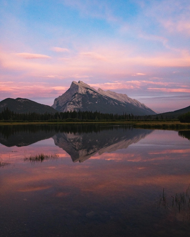 Perfect reflection of Mount Rundle during sunset Vermilion Lakes Alberta Canada 