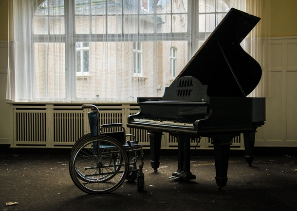 Piano and Wheelchair in Abandoned Luxury Hotel 