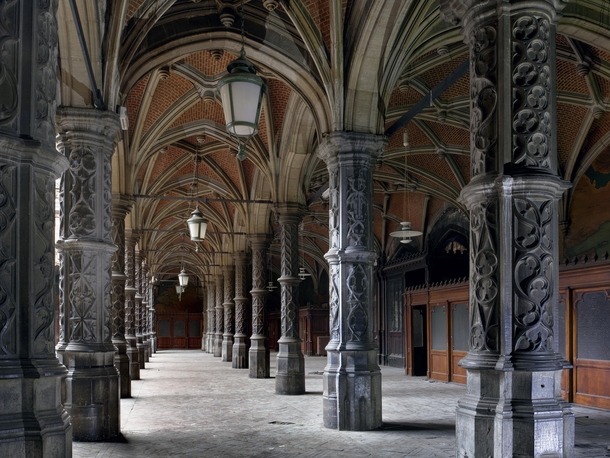 Pillars line the cloisters along the edge of the central courtyard at a historic trading house in Belgium