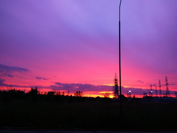Pink sunset over power grids 