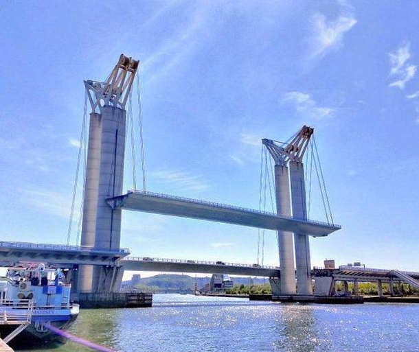 Pont Gustave-Flaubert in France one of the largest vertical lift bridges in the world The center span can be raised up to  feet high and each side can be raised or lowered separately