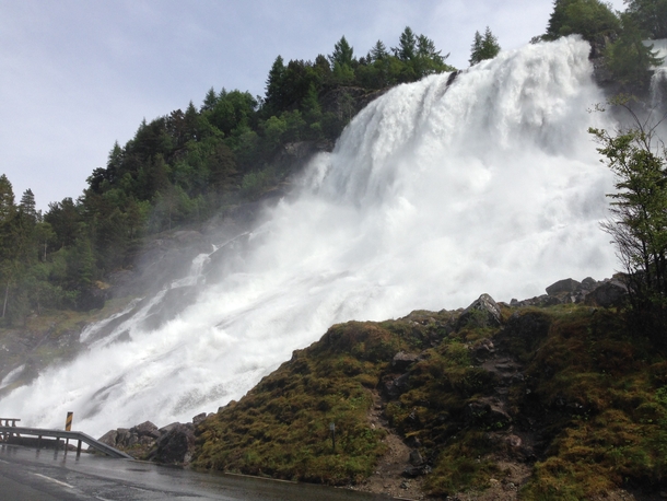 Powerful waterfall right next to the road near Folgefonna Norway 
