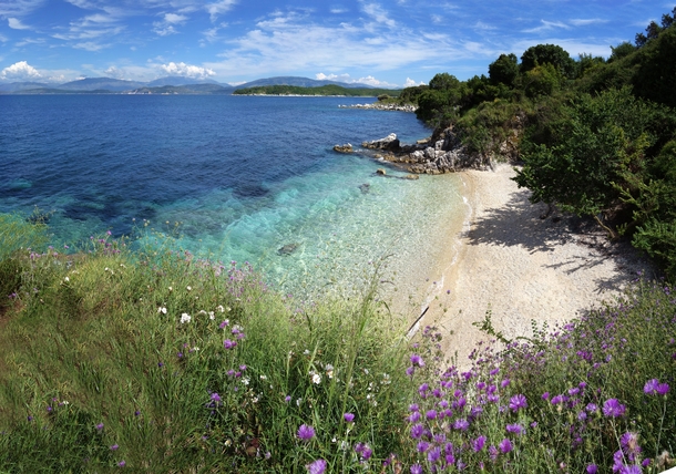 Private dream beach in the low season on Corfu Greece 