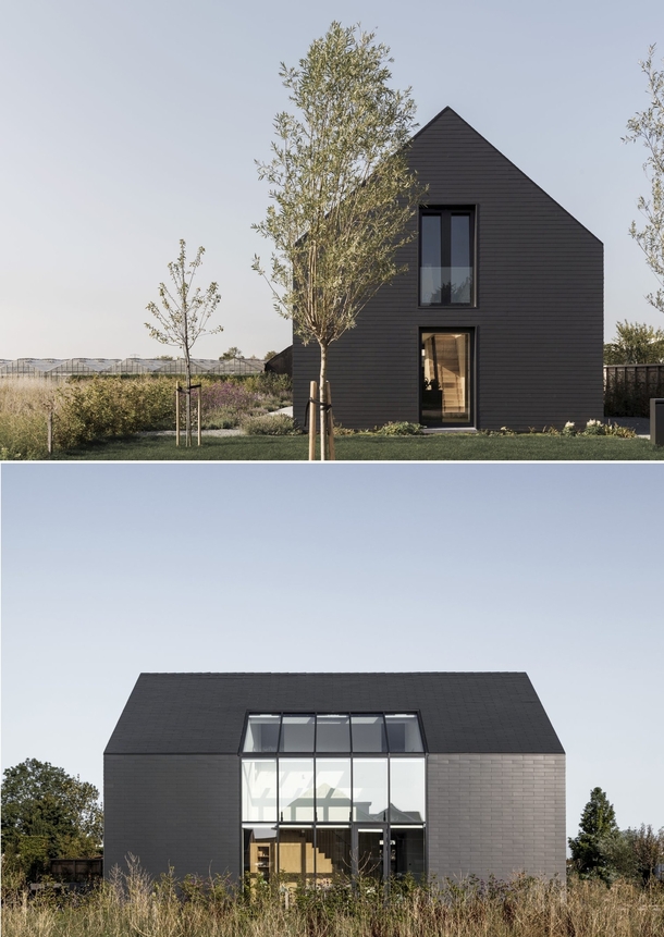 Pure black sculpture house built on a plot in the Zuidplaspolder Netherlands by Studio AAAN Photo Sebastian Van Damme 