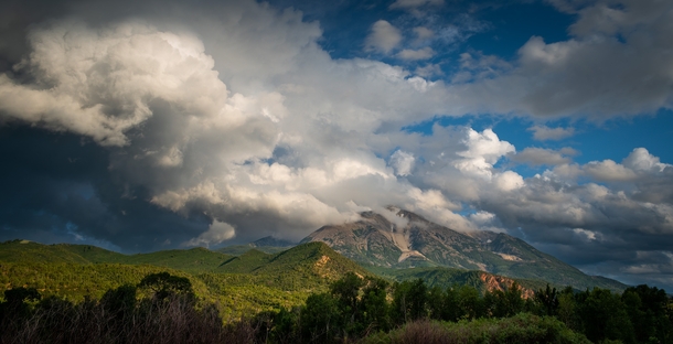 Rain cloud passes over Mount Sopris Colorado 