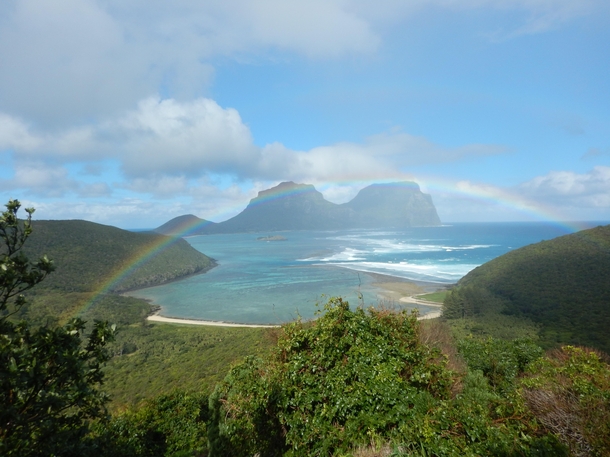 Rainbow across the island seen from near the summit of Mt Eliza Lord Howe Island Australia 