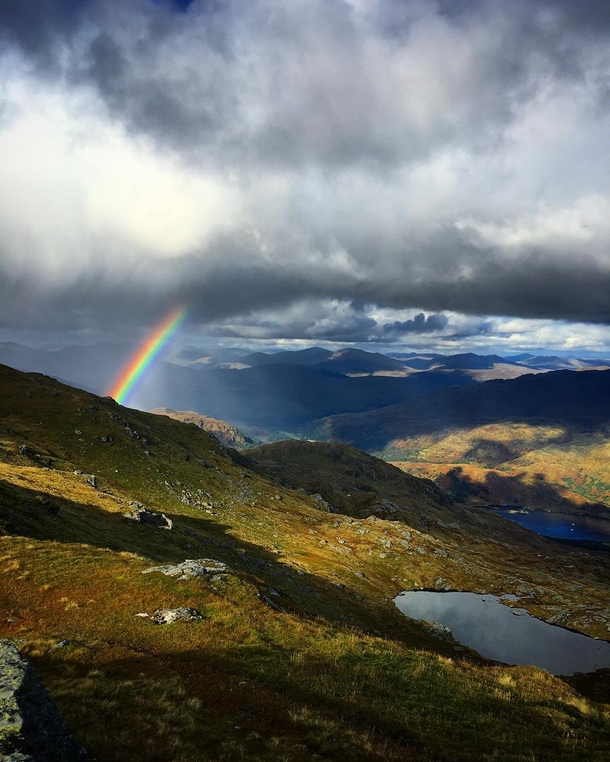 Rainbow amongst the cloudy highlands  Ben Vorlich Scotland 
