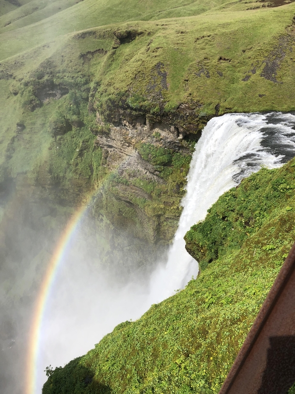 Rainbow created by Skogafoss Waterfall Iceland 