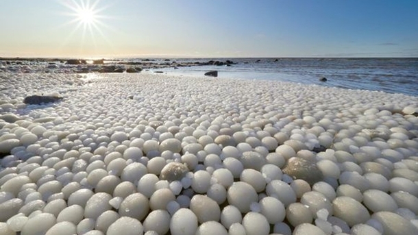 Rare ice eggs found on beach in Finland  Photo RISTO MATTILA